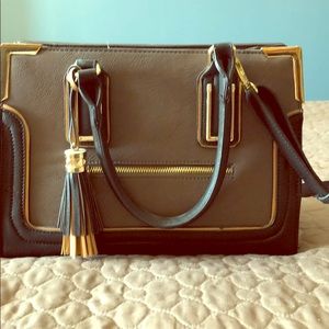 Brown and black leather handbag